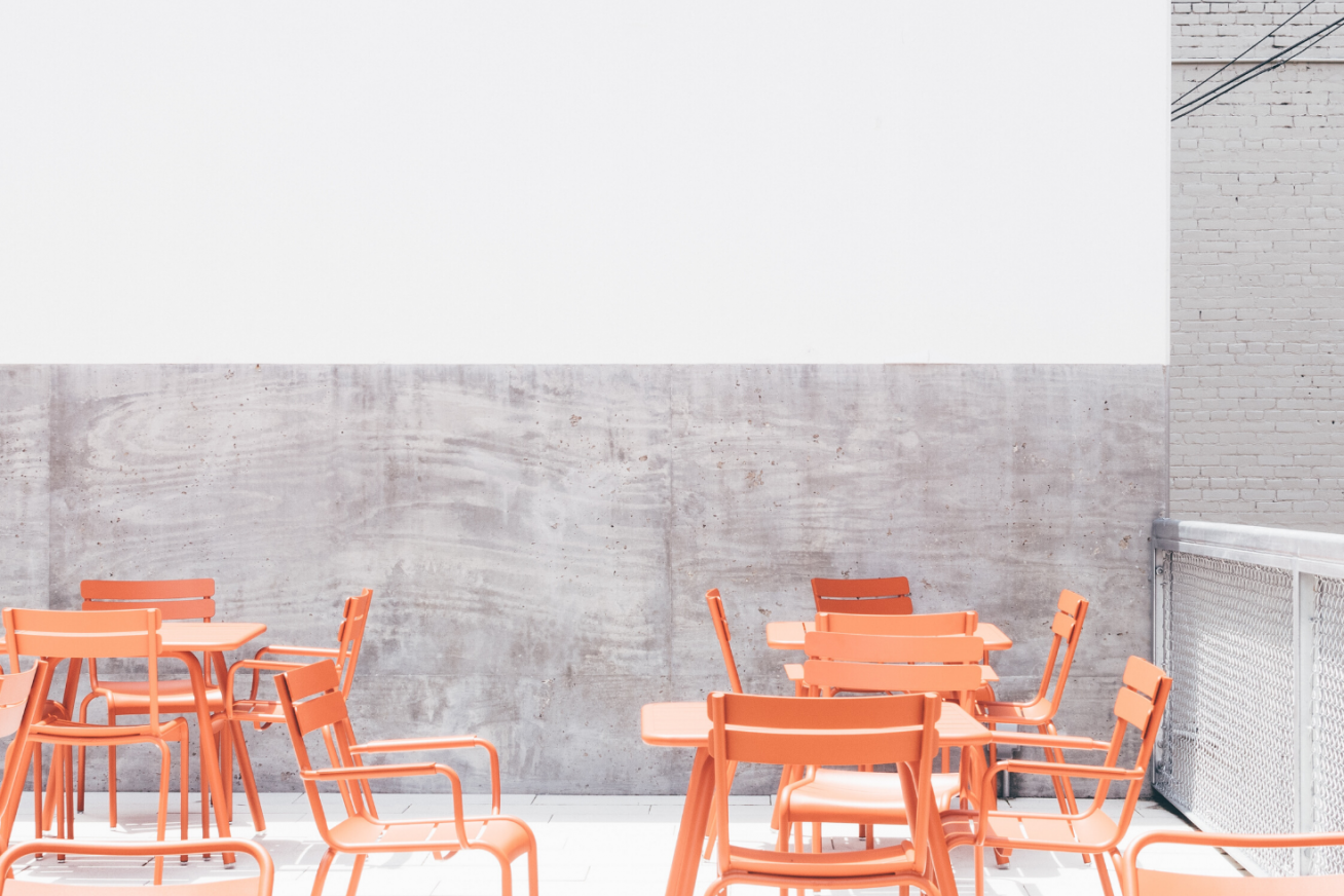 orange benches against a grey background